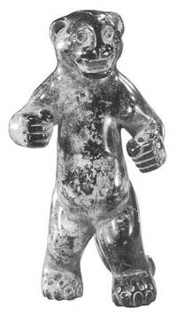 As seen in this ancient Olmec carving, jaguar sculptures with human features are common in Mexico and South America. Anthropologists say that this type of sculpture always represents a were-jaguar.