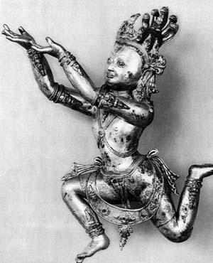 In the 'medusa' form, a Naga will have many snakes emerging from the shoulders and/or head. This sculpture was probably affixed to the base of a large Buddha statue, so that the Naga would be adoring Buddha with upraised hands. Artist and photographer are unknown.